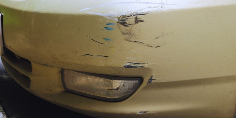 Long mark on a bumper before the gallery bottle repair